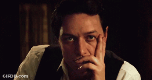 Man With Hand On Face Close Up GIF