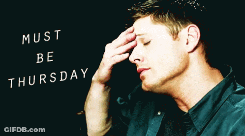 Man With Hand On Forehead In Front Of Must Be Thursday Sign GIF