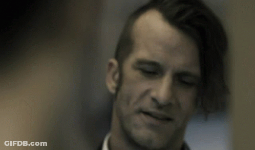 Man With Hand On Head Close Up GIF