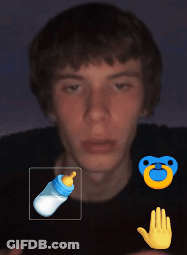 Man With Hand Tattoo Holding Pacifier GIF