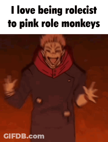 Man With Hands Folded Saying I Love Being Rolecist To Pink Role Monkeys GIF
