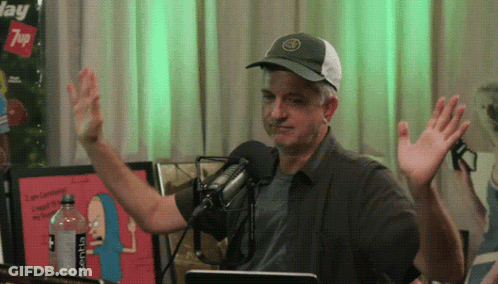 Man With Hands In Air In Front Of 7Up Sign GIF