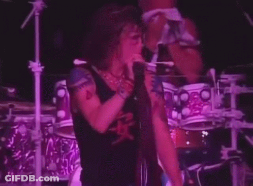 Man With Hands On Head At Microphone GIF