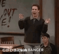 Man With Hands Up At Blackboard GIF