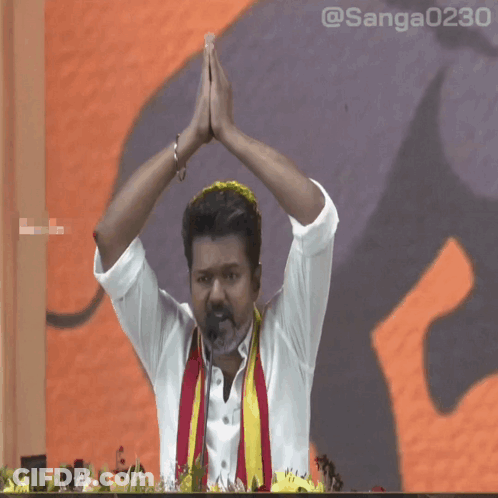 Man With Hands Up In Front Of Screen @Sanga0231 GIF