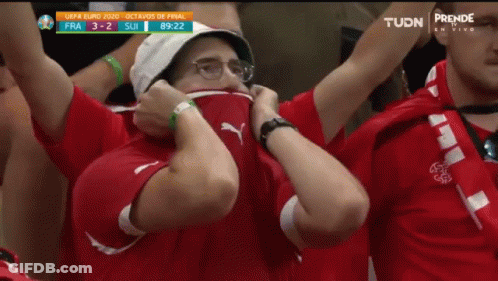 Man With Hat And Glasses Covering Face GIF