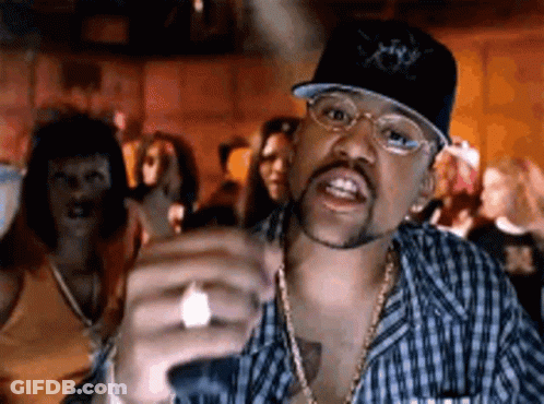 Man With Hat And Glasses In Front Of Group GIF