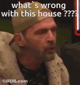 Man With Hat And Headphones Asking What's Wrong GIF