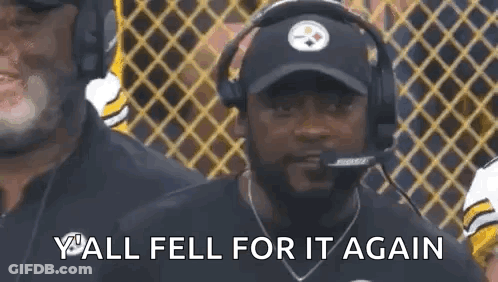 Man With Hat And Headphones Talking Into Microphone Watching Football GIF