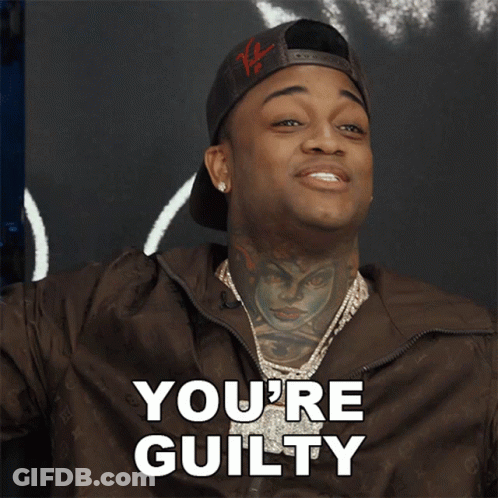 Man With Hat And Jacket Says You're Guilty GIF