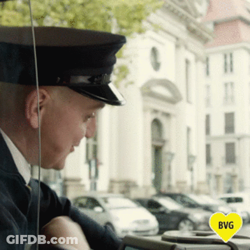 Man With Hat And Yellow Heart Saying BG GIF