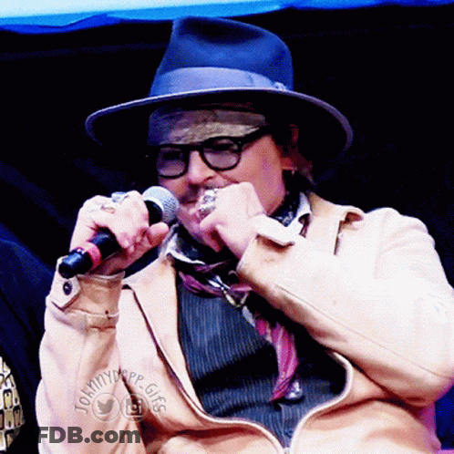 Man With Hat Glasses Holding Microphone Tommytype Gigg Jacket GIF