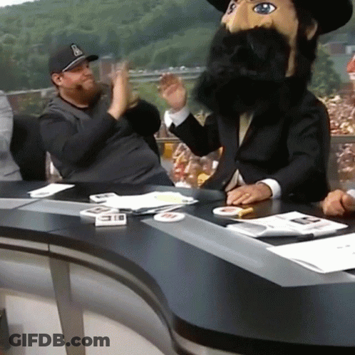 Man With Hat Letter B At Desk GIF