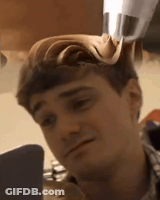 Man With Hat Looking At Laptop GIF