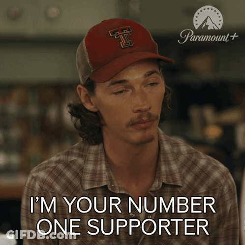Man With Hat Saying 'T' As Number One Supporter GIF