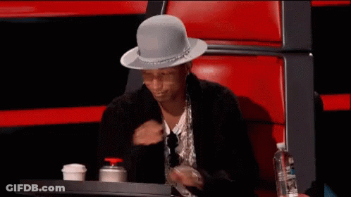 Man With Hat Sitting In Chair GIF