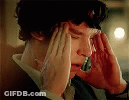 Man With Headache Holding Head GIF
