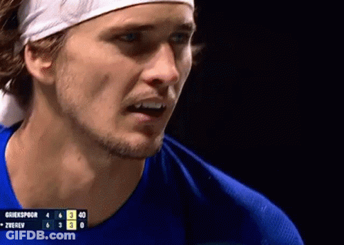 Man With Headband And Blue Shirt At Scoreboard GIF