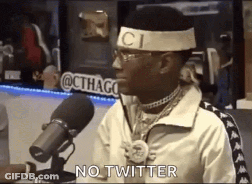 Man With Headband And Glasses Saying No Twitter Into Microphone GIF