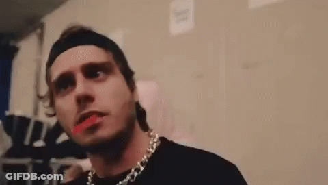 Man With Headband And Necklace Giving Middle Finger GIF