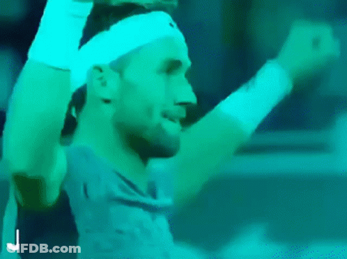 Man With Headband And Wristbands Raising Arms Tennis GIF