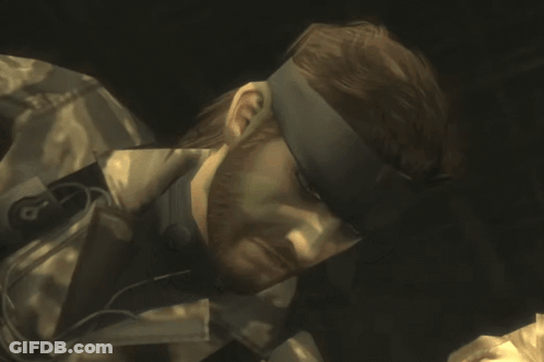 Man With Headband Kissing Woman In Video Game GIF