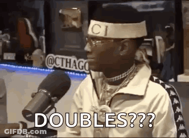 Man With Headband Talking Into Microphone GIF