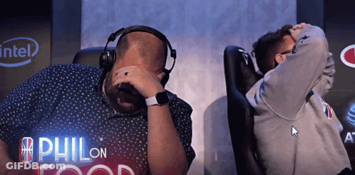 Man With Headphones And Another Man Beside Intel Logo GIF