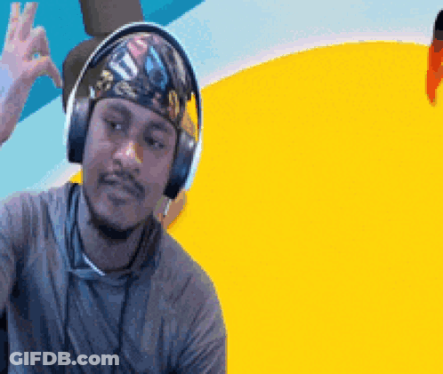 Man With Headphones And Bandana Giving OK Sign GIF