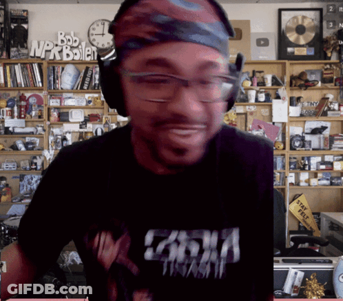 Man With Headphones And Bandana Shirt Says Casha GIF