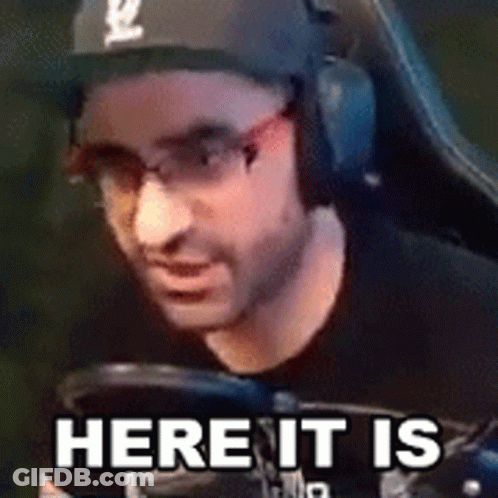 Man With Headphones And Baseball Cap Sitting GIF