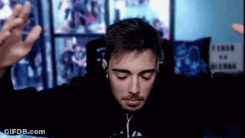 Man With Headphones And Black Hoodie Sitting At Computer GIF