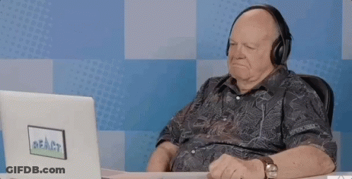 Man With Headphones And Glasses At Computer Monitor GIF