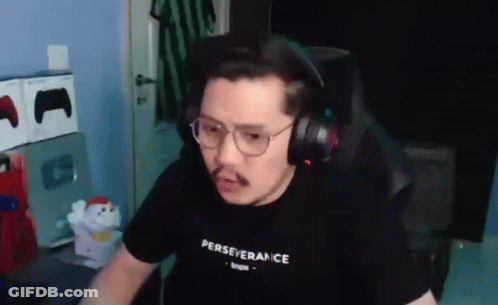 Man With Headphones And Glasses At Computer GIF