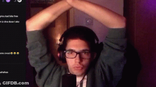 Man With Headphones And Glasses Hands Up At Microphone GIF