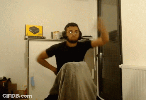 Man With Headphones And Glasses In Front Of Xbox 360 Box GIF