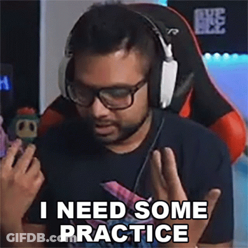 Man With Headphones And Glasses In Gaming Chair Saying I Need Some Practice GIF