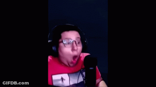 Man With Headphones And Glasses Making Funny Face At Microphone GIF