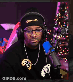 Man With Headphones And Glasses Pointing GIF