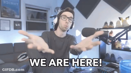 Man With Headphones And Glasses Saying We Are Here GIF