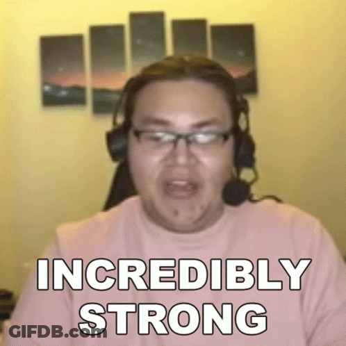 Man With Headphones And Glasses Says Incredibly Strong At Computer GIF