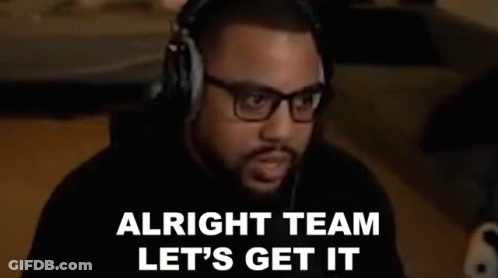 Man With Headphones And Glasses Sitting At Table GIF
