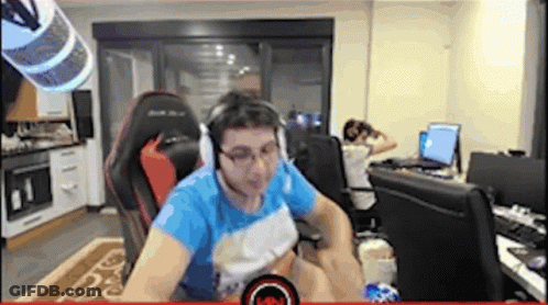 Man With Headphones And Glasses Sitting In Chair GIF