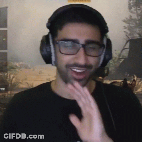 Man With Headphones And Glasses Smiling And Waving GIF