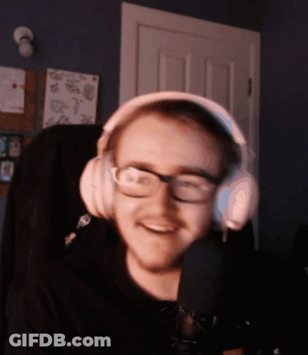 Man With Headphones And Glasses Smiling GIF