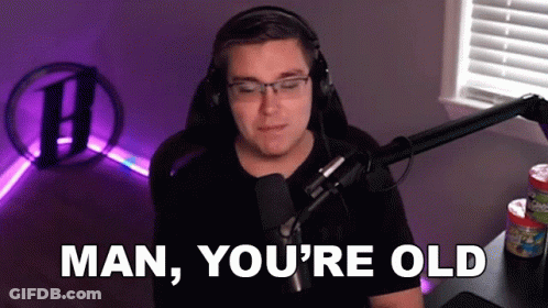 Man With Headphones And Glasses Talking Into Microphone GIF