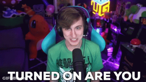 Man With Headphones And Green Shirt Says Turned On Are You GIF