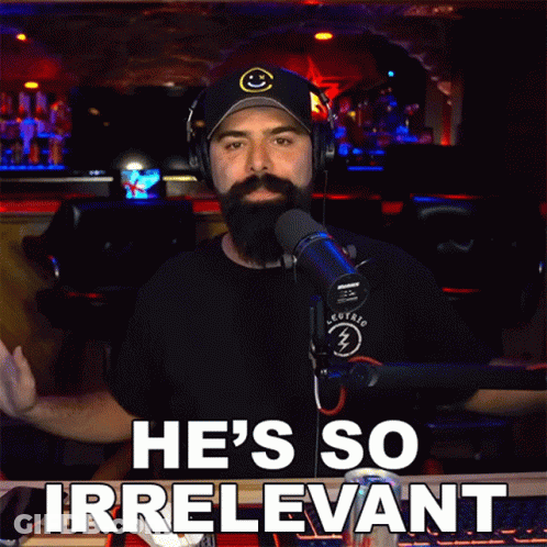Man With Headphones And Hat Says Irrelevant GIF