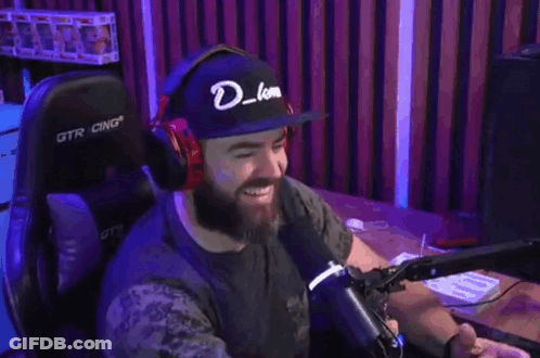 Man With Headphones And Hat With Letter D At Microphone GIF