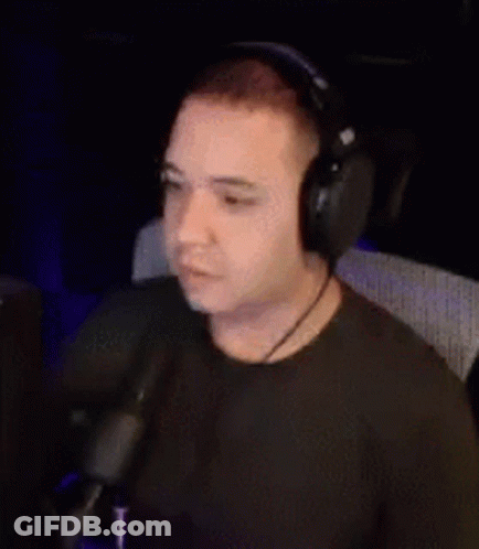 Man With Headphones And Microphone At Computer GIF
